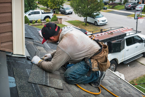 Professional Gutter Installation technician working in Oyster Bay, NY